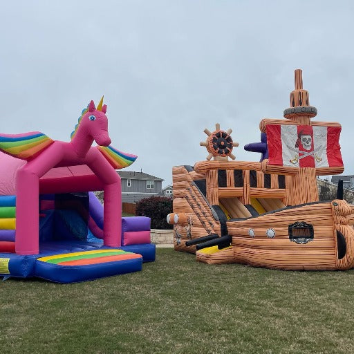 More Bounce To The House bounce house rental in Austin Texas. Unicorn and pirate ship bounce house moonwalk.