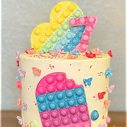 pop-it cake by simply cake austin