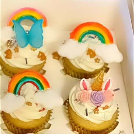 rainbow, butterfly, and unicorn cupcakes by simply cake austin