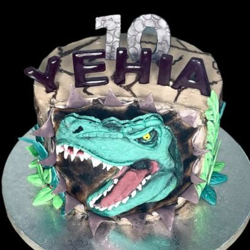 dinosaur cake by simply cake austin