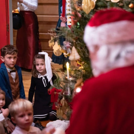 Children meet Santa at a Christmas party by Marvelous Events USA