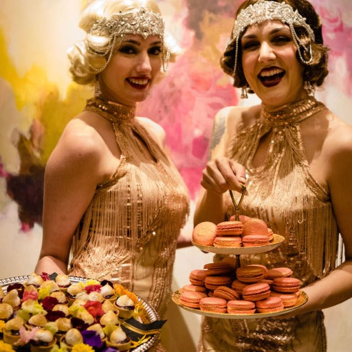 Costumed serveres at a 1920s Gatsby themed birthday party in Austin by Marvelous Events USA